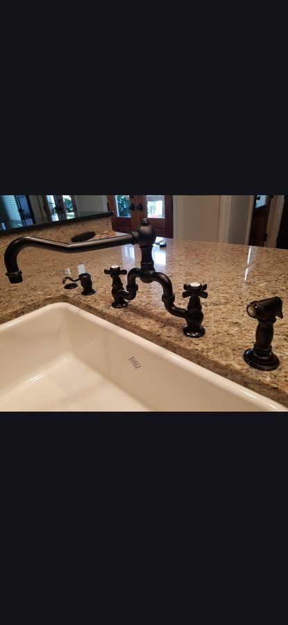 Black Faucet on Granite — Kitchen
