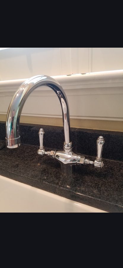 Chrome Faucet on Dark Granite