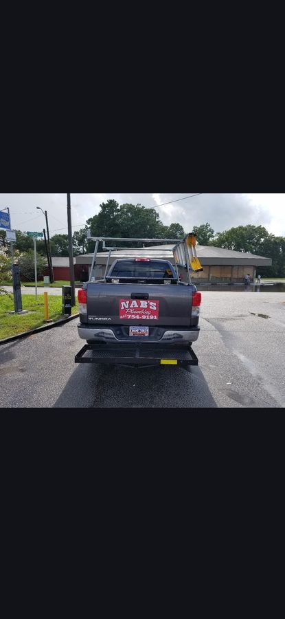 Nab's Plumbing Truck in the Field